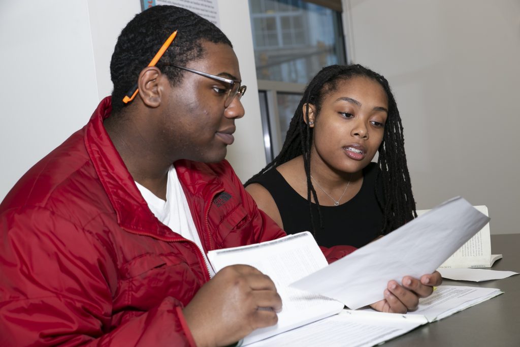 Two students working together.