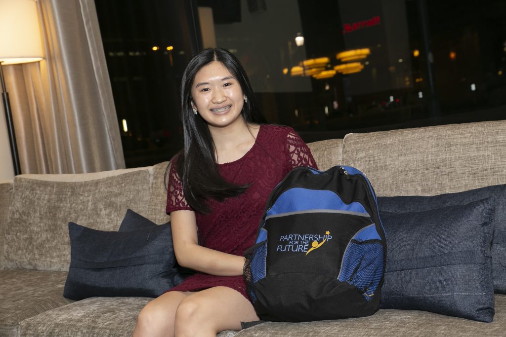 A student with a Partnership for the Future backpack.